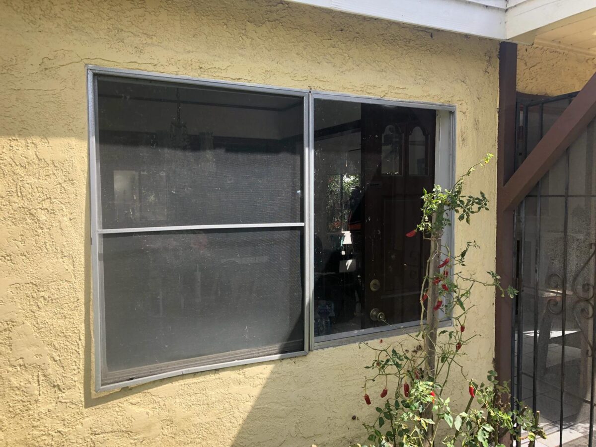 Before image for Yellow Stucco Window Transformation